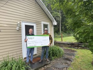 Grant recipient, Matthew with Hometown Mortgage lender.