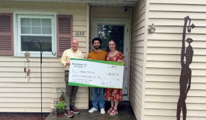 Grant recipient, Sabastian with Hometown Mortgage lender.