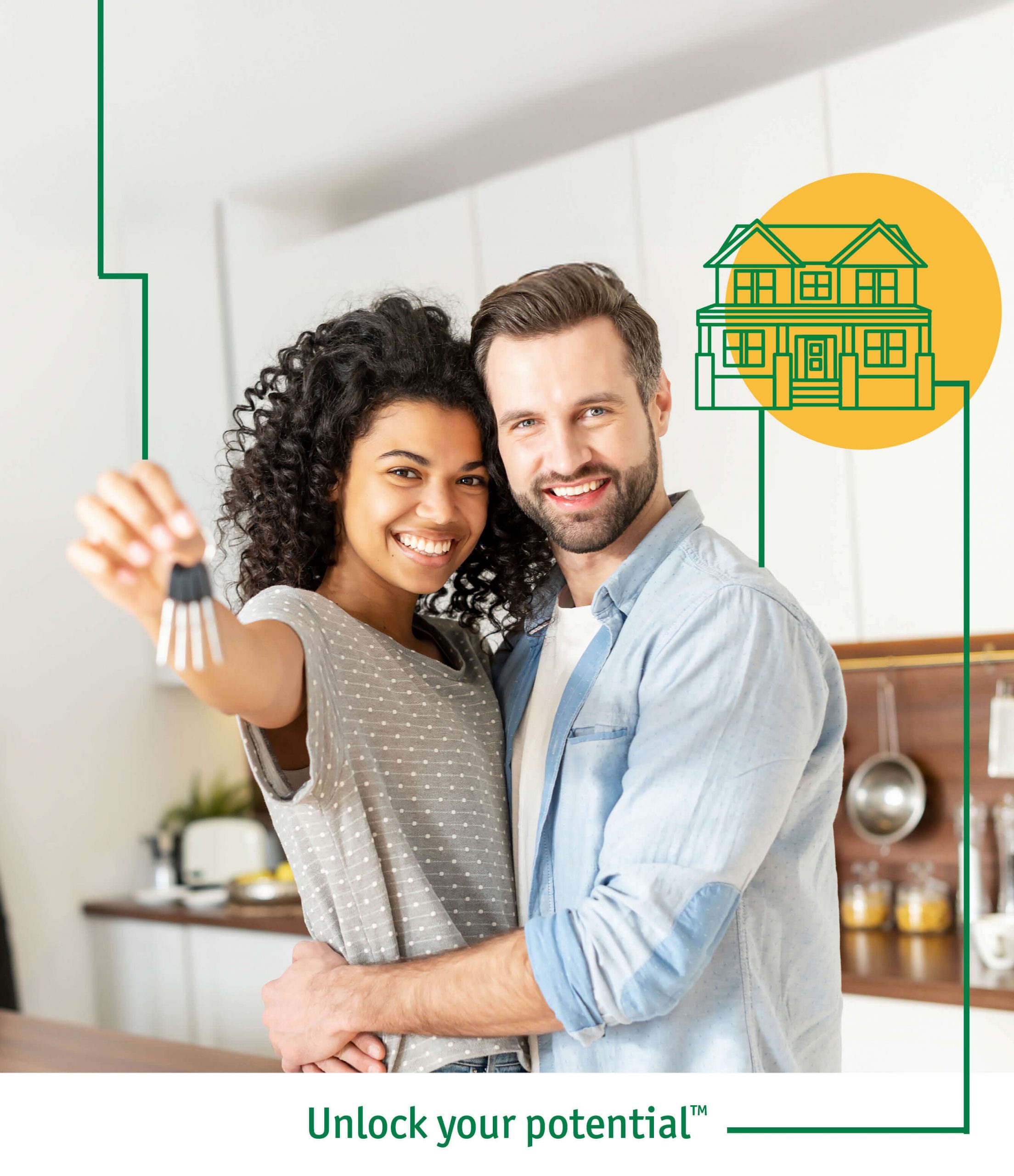 A woman and man holding up a house key in their new home.